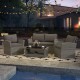 Honhorrs Four-Piece Woven Patio Set, Loveseat and Two Armchairs with Glass Table and Storage Shelf